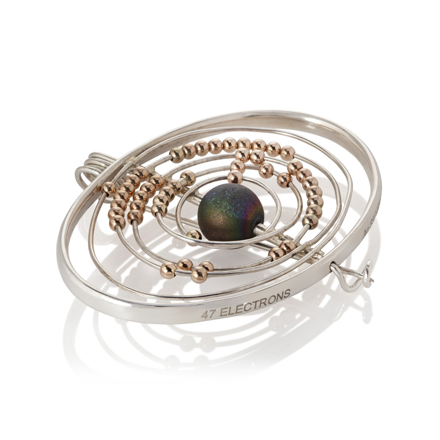 Sue Wainwright silver atom brooch